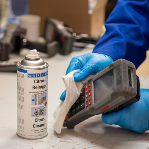 Citrus Cleaner disinfecting a industrial computer